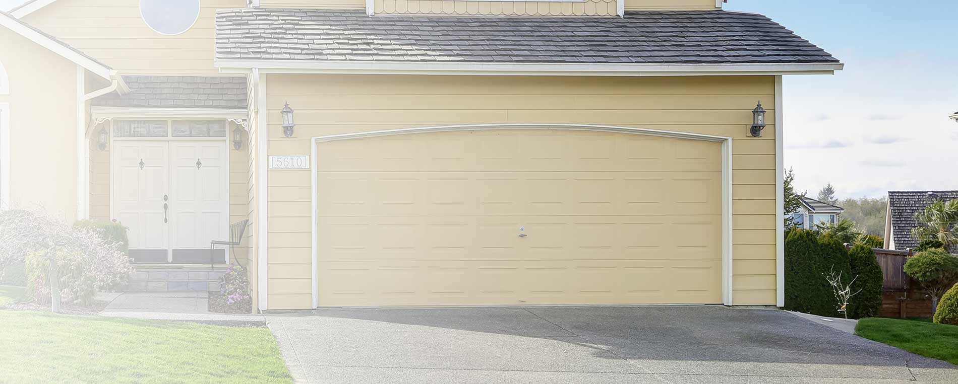 The Pros and Cons of a Wooden Garage Door